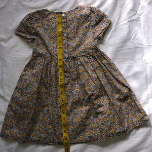 Osh KoshB'gosh  3T Toddler flower sun dress. 3 buttons and partially lined .